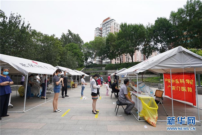 （新華全媒頭條·圖文互動）（5）首都再戰(zhàn)“疫”，難忘40天——寫在北京應急響應級別降級之際 